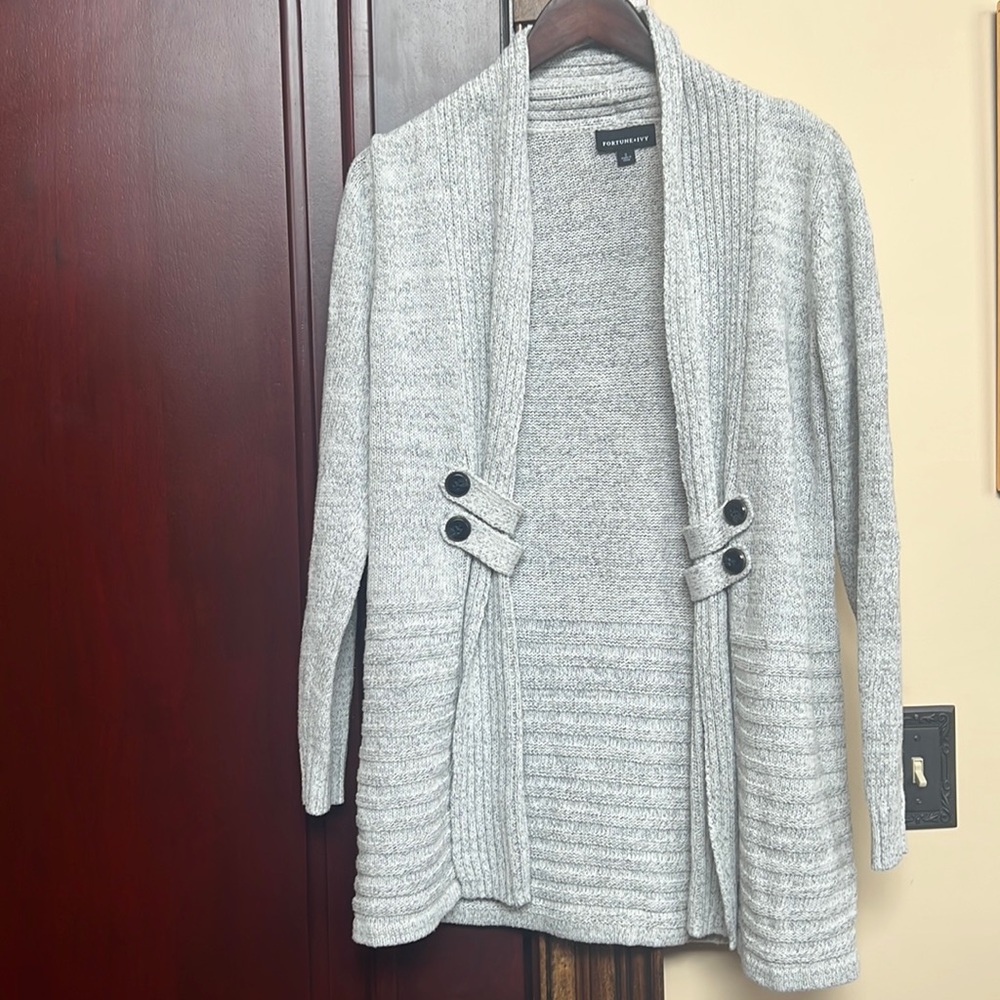 Gray cardigan sweater with black threading throughout.